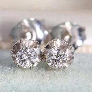 Złote kolczyki z brylantami 0.16ct białe złoto ciekawe 18K